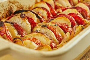 French Gastronomy Ratatouille with Eggplant, Zucchini and Tomatoes. Provencal Tastes, Eggplant, Zucchini and Tomatoes in Ratatouille photo