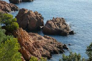 Rocks and sea in the catalan costa brava, mediterranean sea, blue sea photo