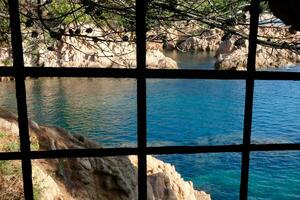 Costa brava and coastal path along the rugged coastline of northern catalonia, Spain photo