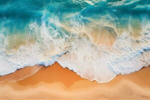 un aéreo ver de el Oceano olas en un arenoso playa. generativo ai foto