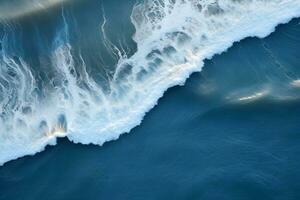 un aéreo ver de un ola rotura en el océano.drone foto fondo de mar ola en pájaro ojo ondas. generativo ai