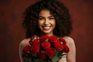 Excited woman with bouquet representing Valentines Day or anniversary photo