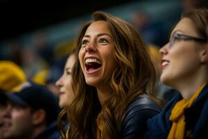 Supportive mother enthusiastically cheers for her daughters team during games photo