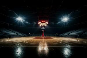 Dramatically lit empty basketball arena view from free throw line photo