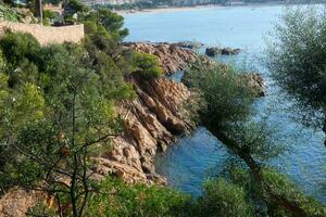 Costa brava and coastal path along the rugged coastline of northern catalonia, Spain photo