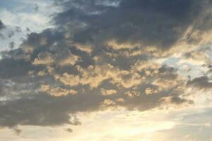 Scattered clouds in the sky indicating a change in weather. photo