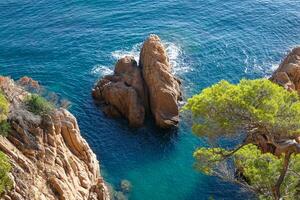 Costa brava and coastal path along the rugged coastline of northern catalonia, Spain photo