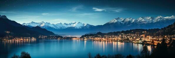Swiss mountainside city in festive glow at sunset background with empty space for text photo
