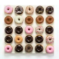 Donut wall. Donuts arranged on a wall for a fun display. isolated photo