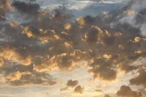 Scattered clouds in the sky indicating a change in weather. photo