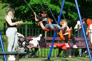 Most Beautiful Image of People at Wardown Public Park of Luton city, England United Kingdom, UK. May 25th, 2023 photo