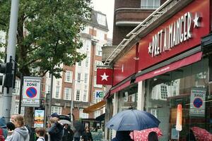 Most Beautiful Image of International and Local Tourist People are Visiting The Central London Capital City of England UK During Rainy Day. Captured on August 2nd, 2023 photo