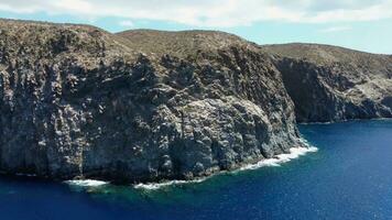 Large rock formations that look like Los Gigantes right on the atlantic ocean on the Canary Island of Tenerife. photo