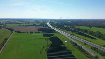 Aerial view on the A7 motorway in northern Germany between fields and meadows. photo