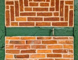 bella textura de antiguas paredes de ladrillo con entramado de madera encontradas en alemania. foto