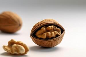 a group of walnuts sitting next to each other on a solid white background AI Generated photo