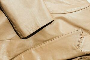 marrón cuero chaqueta textura, genuino suave cuero foto