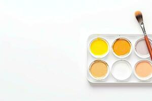 Watercolor paints and brush isolated on white background. Top view. Generative AI photo