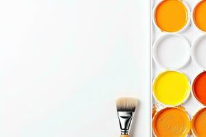 Watercolor paints and brush isolated on white background. Top view. Generative AI photo