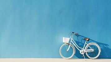 Bicycle on blue wall with copy space for your text or design. Generative AI photo