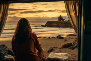 Young woman in her camper enjoying a scenic beach view, a tranquil moment of wanderlust and adventure. Generative AI photo
