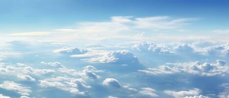 Panoramic view of fields and clouds from an airplane window. The sky is a bright blue with fluffy white clouds. Generative AI photo