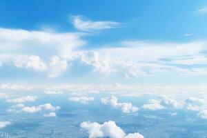 Panoramic view of fields and clouds from an airplane window. The sky is a bright blue with fluffy white clouds. Generative AI photo