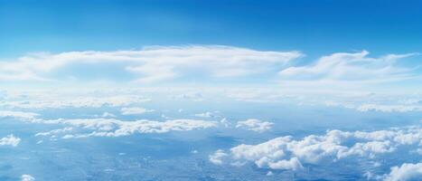 Panoramic view of fields and clouds from an airplane window. The sky is a bright blue with fluffy white clouds. Generative AI photo