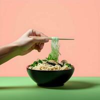 A hand holding a bowl full of ramen noodles and chops. High quality. AI Generative photo