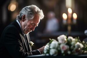 closeup shot of a senior man in front of a funeral bouquet AI generated photo