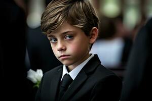 Portrait of a boy in a black suit with a funeral bouquet of flowers AI generated photo