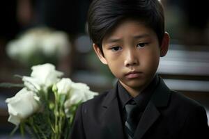 Portrait of little asian boy with sad expression.Funeral concept AI generated photo