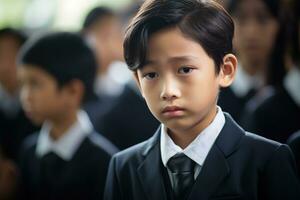 Portrait of little asian boy with sad expression.Funeral concept AI generated photo