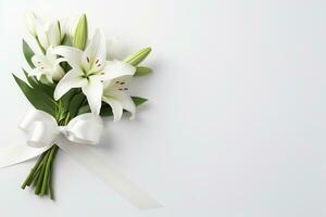 White lily bouquet with ribbon on white background.Funeral Concept AI generated photo