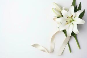 White lily bouquet with ribbon on white background.Funeral Concept AI generated photo