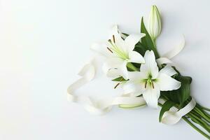 White lily bouquet with ribbon on white background.Funeral Concept AI generated photo