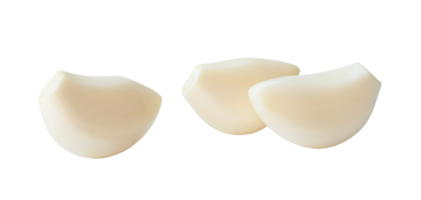 Front view of fresh garlic cloves in stack isolated with clipping path in png file format. Close up photo