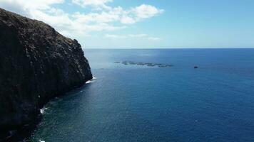 Large rock formations that look like Los Gigantes right on the atlantic ocean on the Canary Island of Tenerife. photo