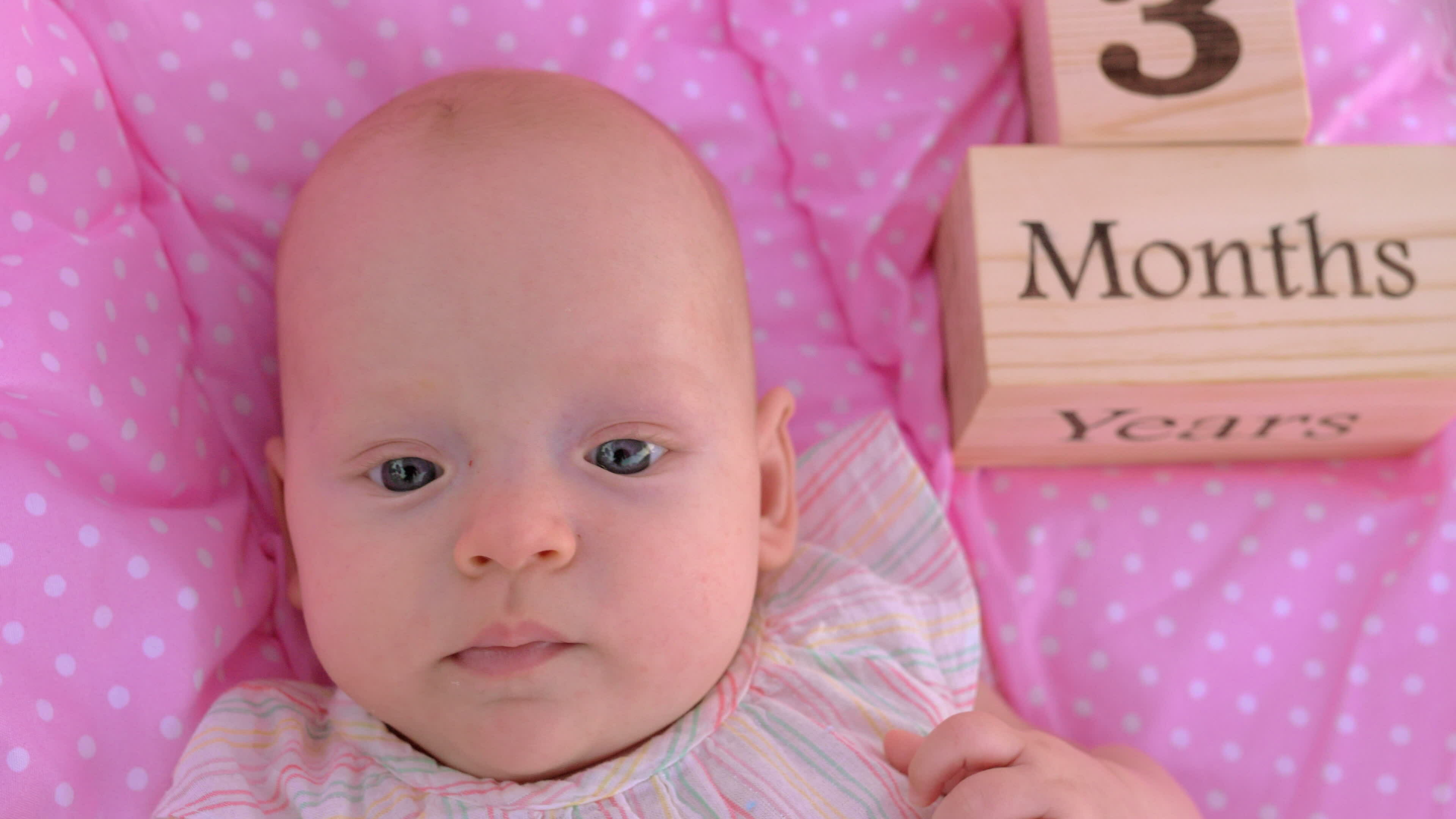 Portrait of three months baby girl 30799773 Stock Video at Vecteezy