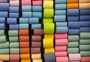 Close up view on samples of cloth and fabrics in different colors. photo