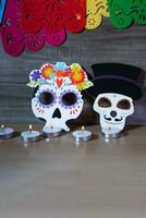 Sugar skull decoration on wooden background. photo