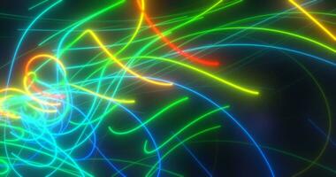 Abstract multi-colored rainbow neon energy laser lines flying on a black background photo