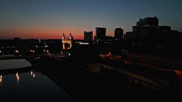 Zoom out aerial view of Vilnius City at night video