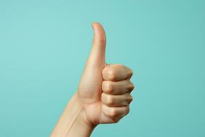 Female hand showing thumbs up on pastel blue background AI Generated photo