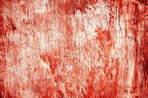 Dark red blood on old wall for halloween concept photo