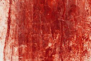 Dark red blood on old wall for halloween concept photo