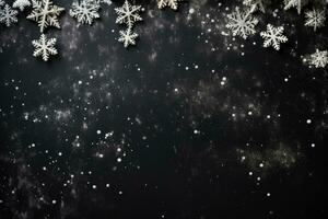 A festive background with white snow on a black canvas photo