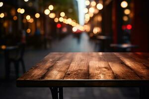 The dark wood table in the cafe has a blurred background photo