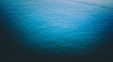 Blue water surface background photo