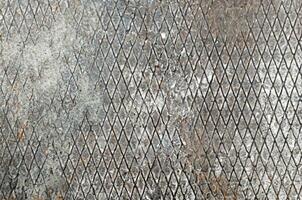 Metal texture with dust scratches and cracks. photo